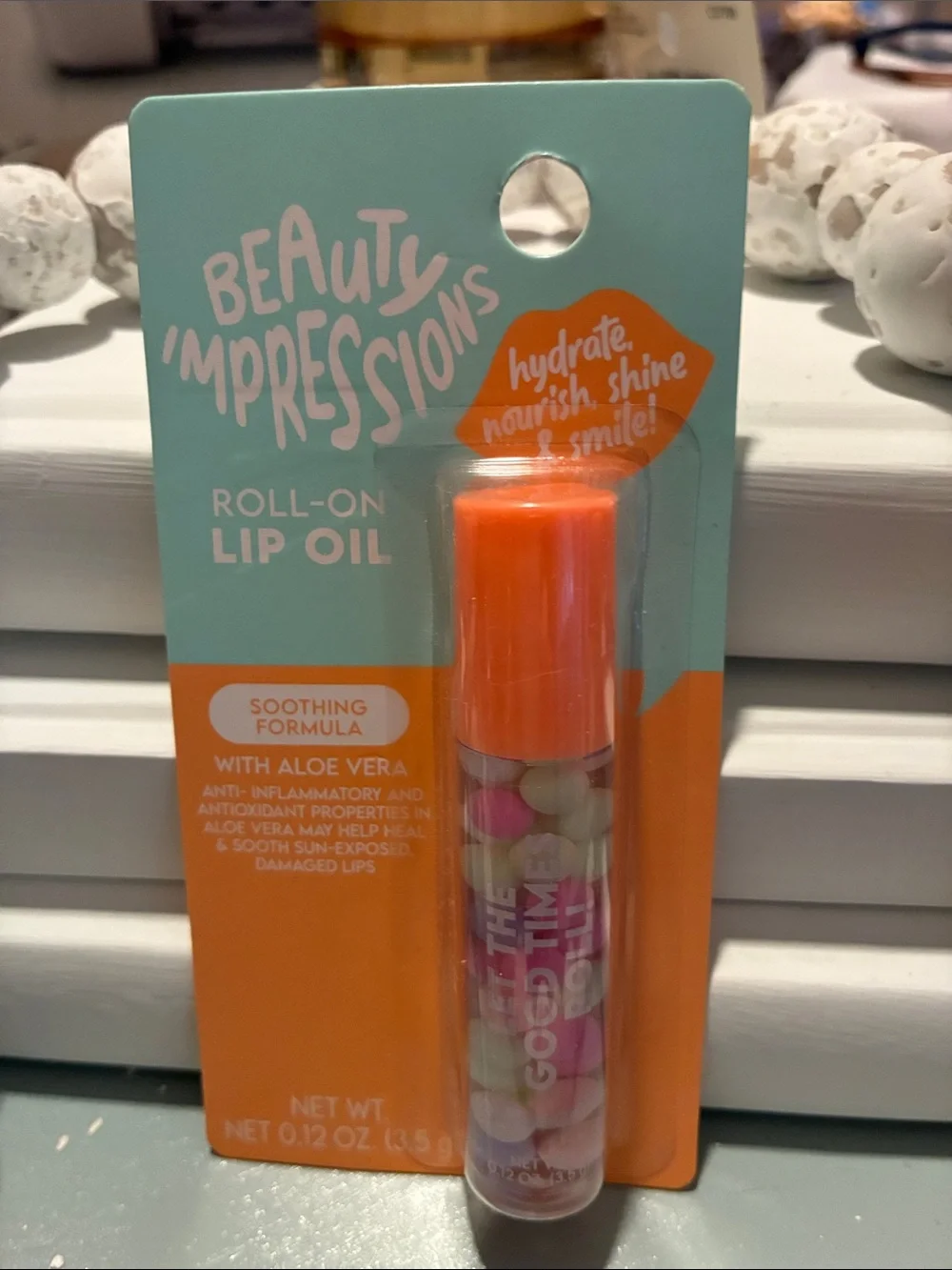 Impressions Roll-On Lip Oil Duo with Teal & Orange Caps